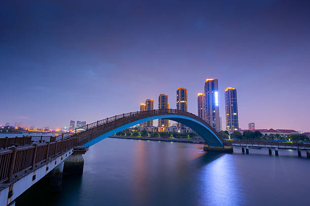 istock Arch bridge at apartment at dusk 531987497