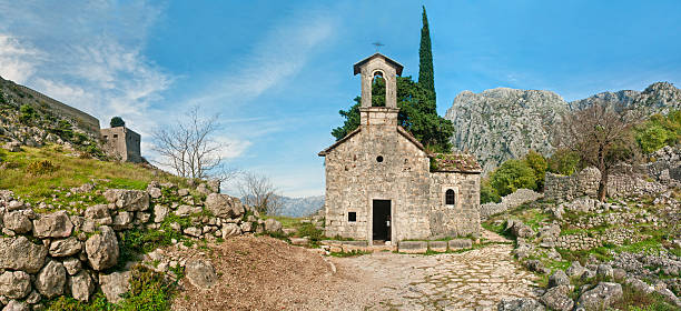 istock medieval chapel in mountains panorama 531988015