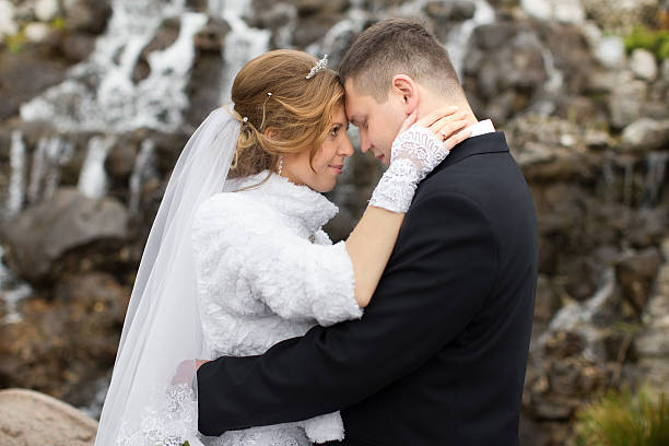 istock Walking bride and groom in nature 531988276
