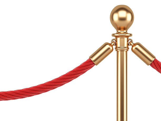 istock closeup gold stanchions with rope 531988981