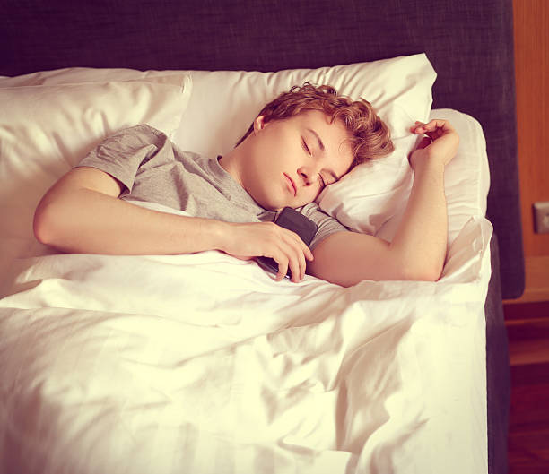 istock Close up of a young man sleeping on the bed 531989792