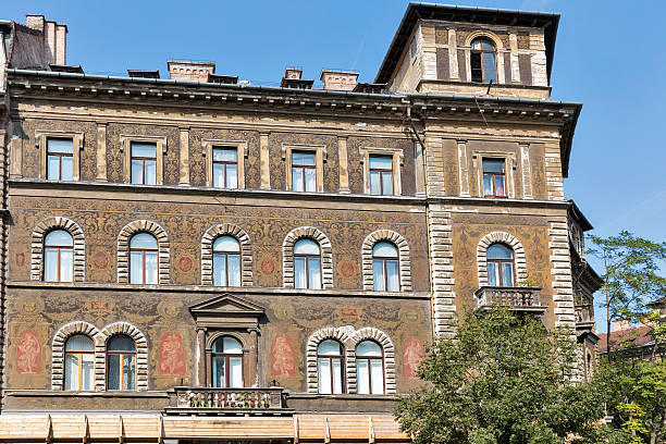 Old and beautiful building facade in Budapest, Hungary, Europe. Kodaly korond is a circus square with beautifully painted old buildings and statues of four of Hungary's great heroes in each corner.