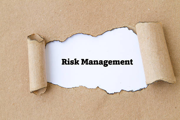 istock Risk Management written under burnt torn paper. 531991556