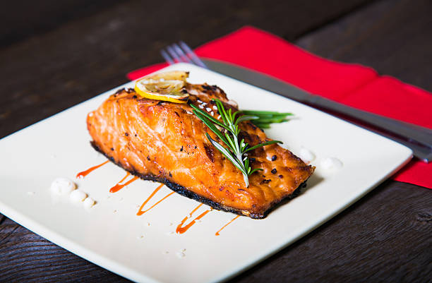 istock Salmon fillet with lemon and rosemary 531991659