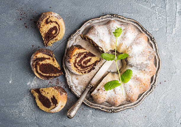 istock Zebra bundt cake cut into pieces and mint leaves 531994522