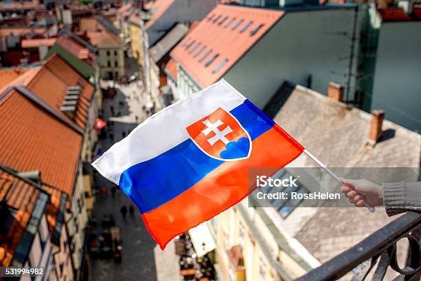 Slovak Flag On Bratislava City Background Stock Photo - Download Image Now - Architecture, Bratislava, Building Exterior