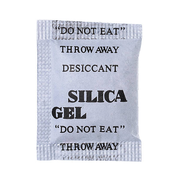 istock Silica gel in bag isolated on white 532006347
