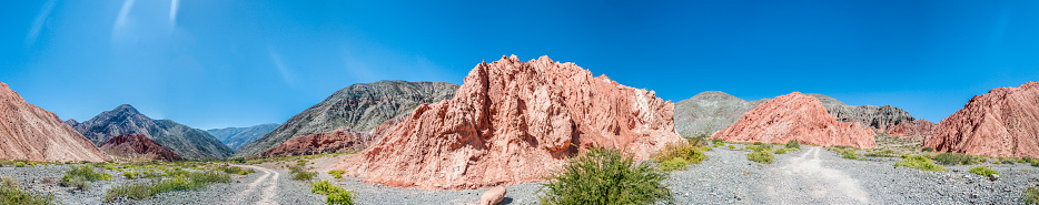 Los Colorados path in Purmamarca, near Cerro de los Siete Colores (The Hill of Seven Colors), in the colourful valley of Quebrada de Humahuaca in Jujuy Province, northern Argentina.