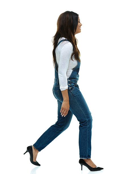 istock Smiling fashionable woman walking 532009405