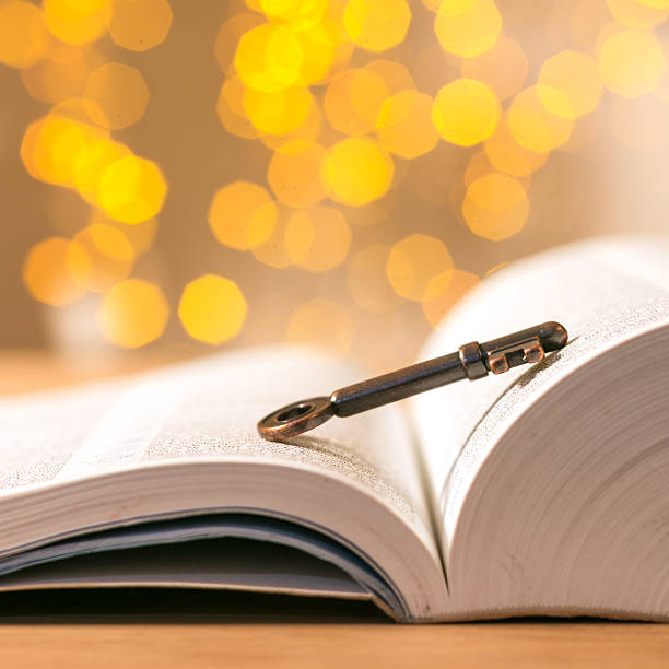 istock key and book with flares background 532010067