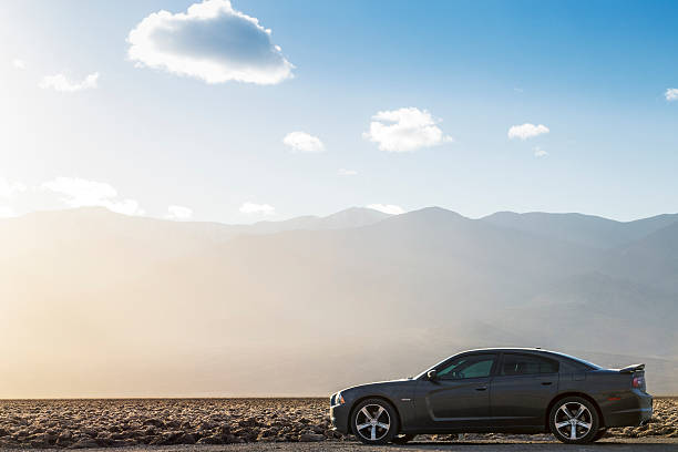 Dodge Charger Death Valley National Park, California - USA - December 25, 2014: A Dodge Charger on the desert. dodge charger stock pictures, royalty-free photos & images