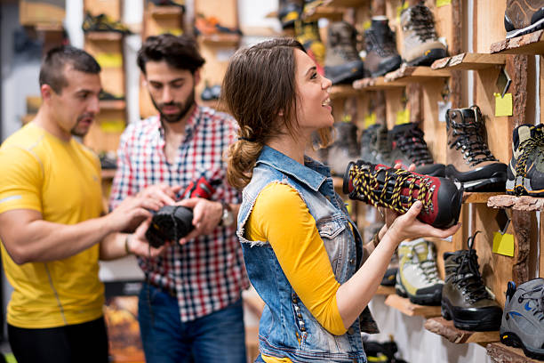 istock Young people buying hiking shoes 532022777