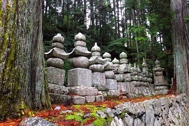 istock Grave stones in ancient Japanese cemetery, Mount Koya 532025071
