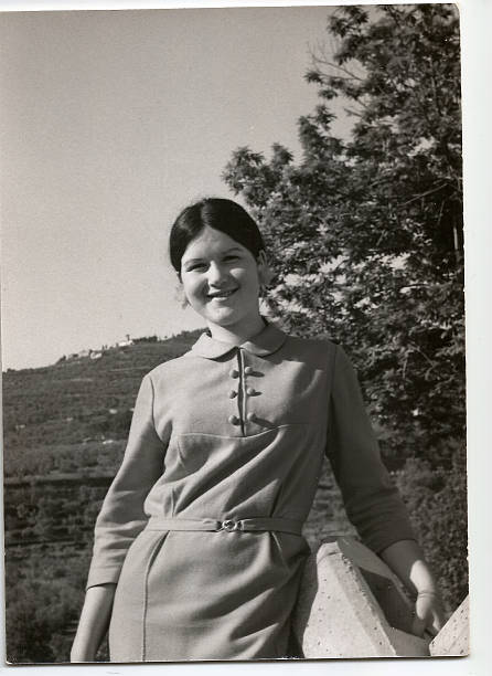 istock 70s young woman outside 532025311