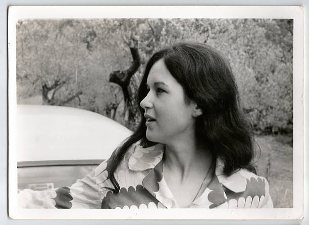 istock 70s young woman outside 532025343