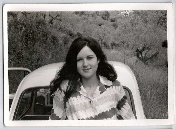 istock 70s young woman outside 532025349
