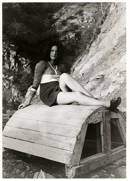 istock 70s young woman outside 532025389