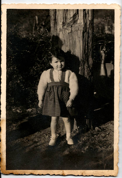 istock 70s little child outside 532025455