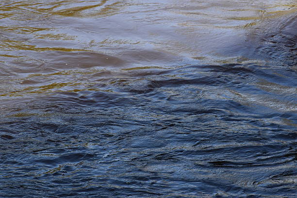 istock Turbulent water abstract background 532027594
