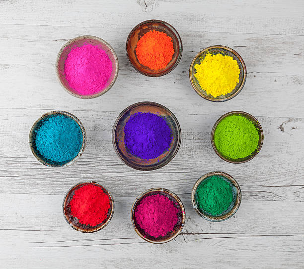 istock Holi powder in cups arranged in circle 532028224