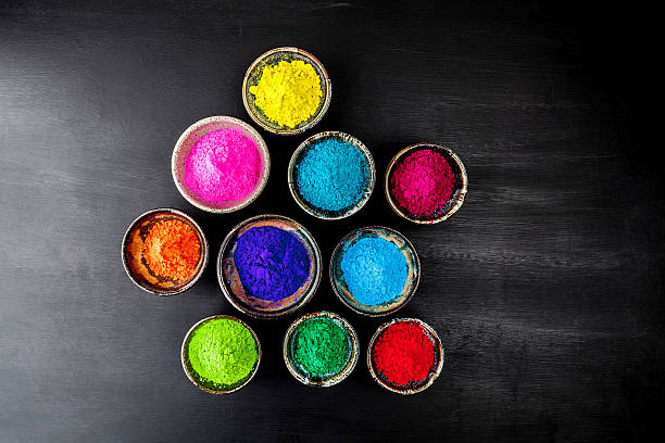 istock Holi powder on grungy chalkboard 532028376