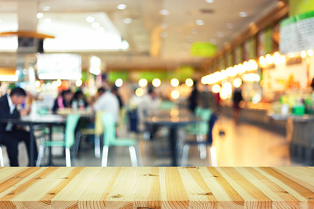 Food court blurred Defocused or blurred photo of food court. food court photos stock pictures, royalty-free photos & images