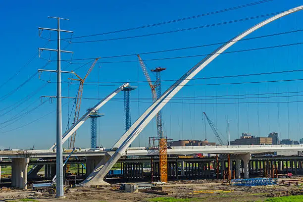 Photo of Cranes constructing freeway bridge, Dallas Texas (P)