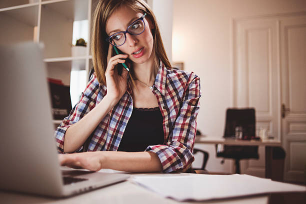 istock Young businesswoman using smartphone 532032926