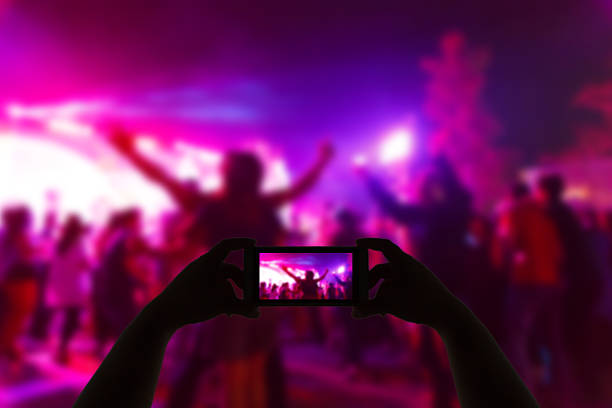 istock Take photo concert in front of stage 532032940