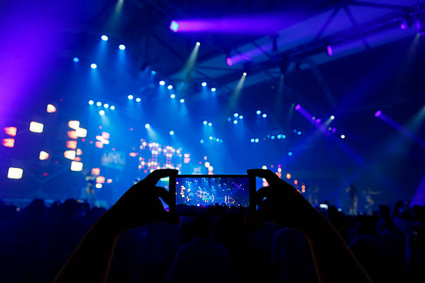 istock Take photo concert in front of stage 532032978