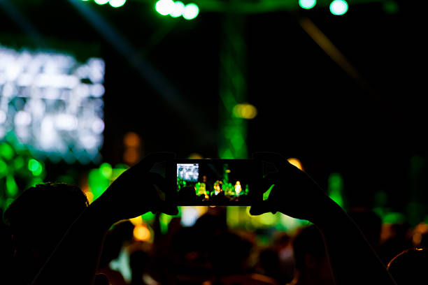 istock Take photo concert in front of stage 532033032