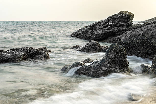 istock Long exposure shot. Sea scape with stone beach at Thailand 532033594