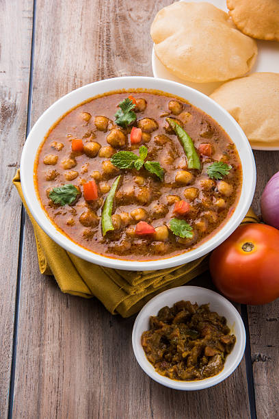 istock spicy chick peas / Chola Masala / Chana Masala puri 532036124