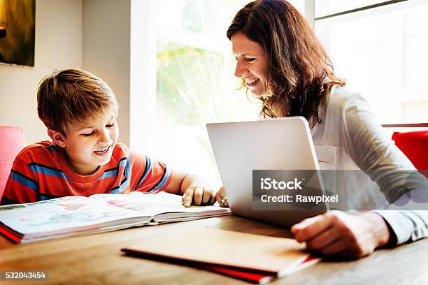 Home School Learning Homework Reading Concept Stock Photo - Download Image Now - Homework, Mother, Parent