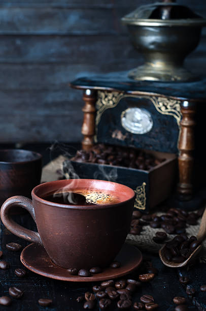 istock Coffee cup and saucer on a wooden table. 532045330