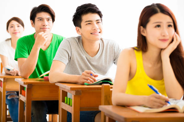 istock young college student group sitting in a classroom 532045860
