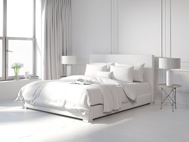 chambre moderne tout blanc - bedding photos et images de collection