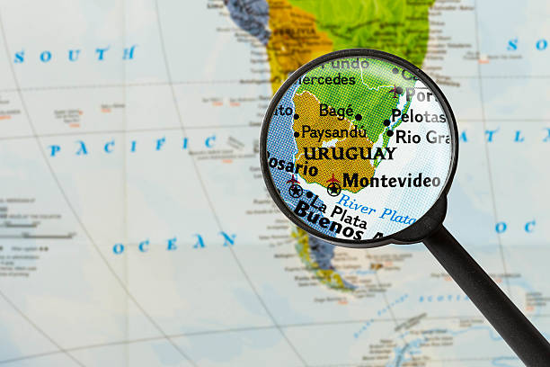 карта восточной республики уругвай - focus globe magnifying glass glass стоковые фото и изображения