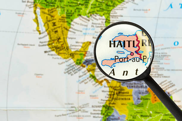 карта республики гаити - focus globe magnifying glass glass стоковые фото и изображения