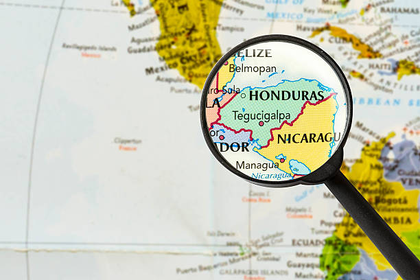map of Republic of Honduras map of Republic of Honduras through magnifying glass honduras stock pictures, royalty-free photos & images