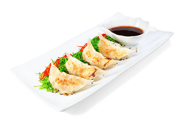 istock Dumplings, ravioli filled with seafood. With black vinegar. 532052041