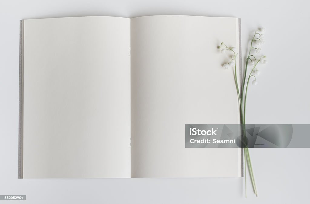 Open Empty Book With Lily Of The Valley Stock Photo - Download