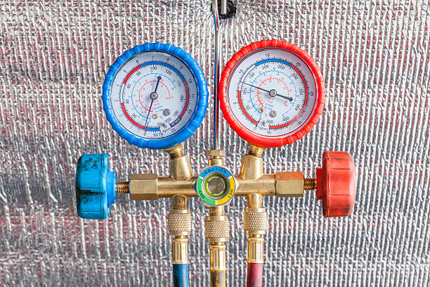 istock Pressure gauges for auto air conditioner recharge. 532053084