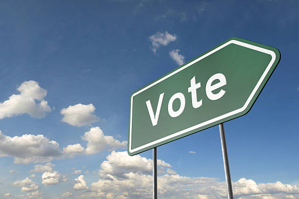 istock Vote green arrow highway road sign 532053158