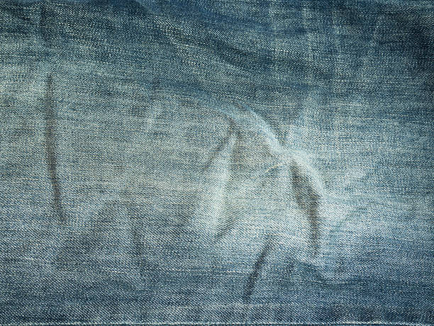 istock Texture of blue jeans for background 532055262