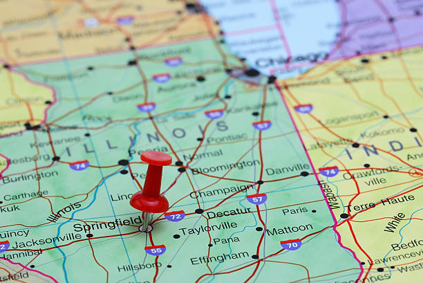 Photo of pinned Springfield on a map of USA. May be used as illustration for traveling theme.