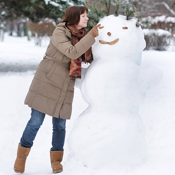 istock Happy woman having fun in winter 532056353