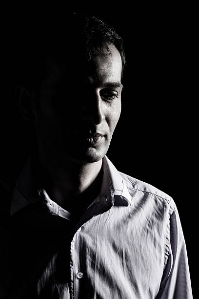 istock Low key portrait of a serious man 532056525
