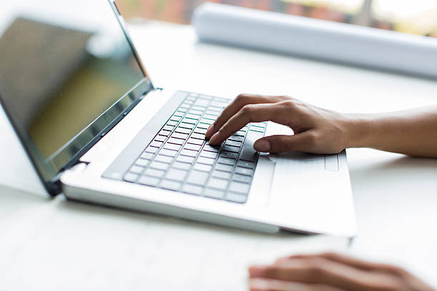 istock Young woman working on laptop 532057151