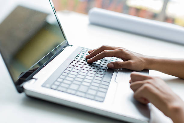 istock Young woman working on laptop 532057161